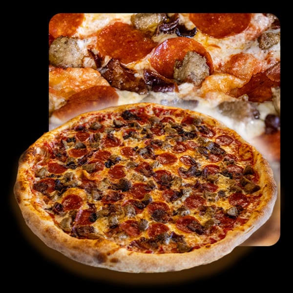 Golden Lizzard Pizza's meat lover's pizza, topped with pepperoni, sausage, and ground beef.