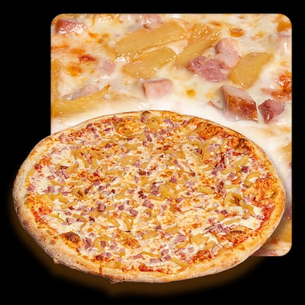 Golden Lizzard Pizza's Hawaiian pizza with ham and pineapple chunks, with a close-up of the toppings behind it.